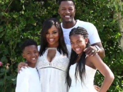 Elijah Alexander Knox, Flex Alexander, Shanice, and Imani Shekinah Knox are posing for the picture in all white.